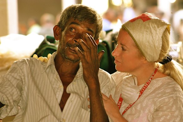 Thompson helping in the aftermath of the Boxing Day tsunami.