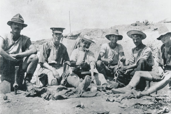 Men of the 8th Battalion in an abandoned Turkish position on Bolton's Ridge.  