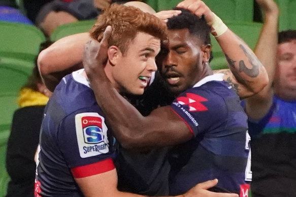 The Rebels celebrate a try in early March, before the season was suspended.