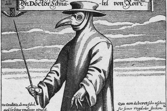A 17th-century plague doctor in protective gear.