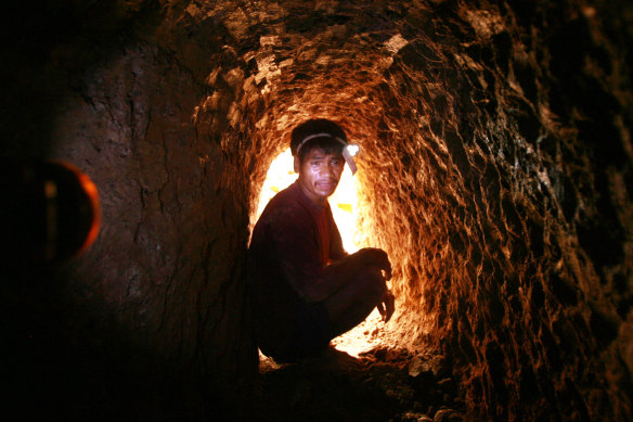 A miner in  Didipio, Phillippines, where Melbourne-based company OceanaGold planned to dig up $3.6 billion worth of gold and copper from beneath a hill overlooking the village. Photographer Jason South took the pictures on Nick McKenzie’s first overseas assignment.