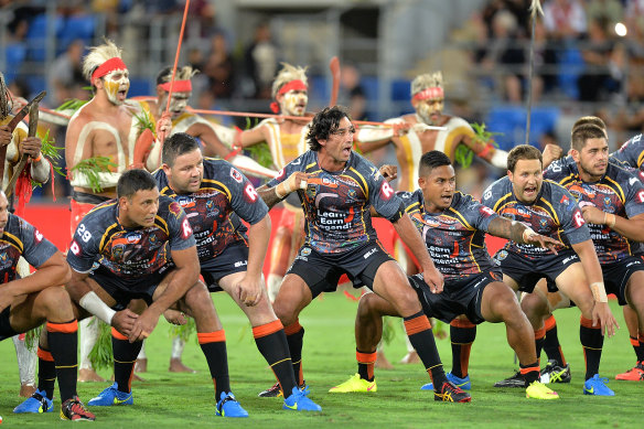Johnathan Thurston leads the Indigenous side in a war dance before the 2015 All Stars Game.