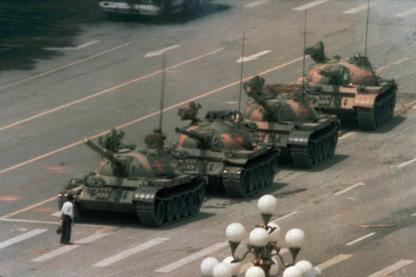 The famous 1989 picture of an unknown Chinese man standing alone to block a line of tanks heading east on Beijing's Changan Boulevard in Tiananmen Square.