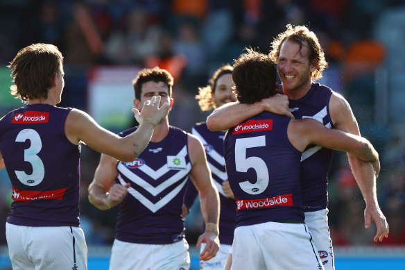 Fremantle celebrates a goal.