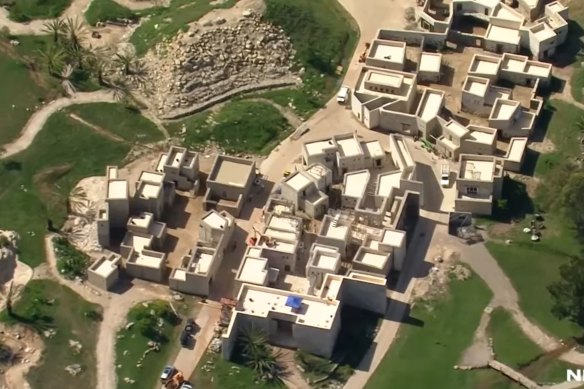 This aerial view shows a Middle Eastern-style village constructed by the Jehovah’s Witness religious group in Denham Court in south-west Sydney. 