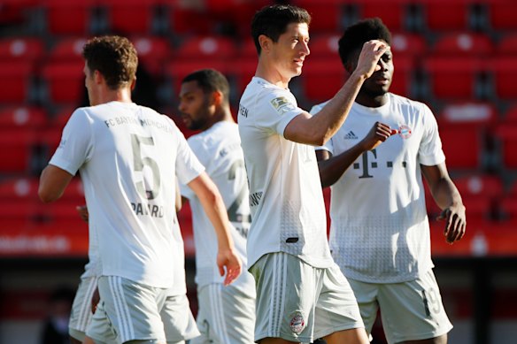 Robert Lewandowski celebrates scoring the opener in Bayern's 2-0 Bundesliga win over Union Berlin.
