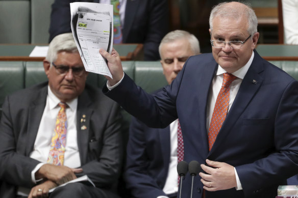Minister for Indigenous Australians Ken Wyatt listens as Prime Minister Scott Morrison delivers his Closing the Gap statement on February 12.