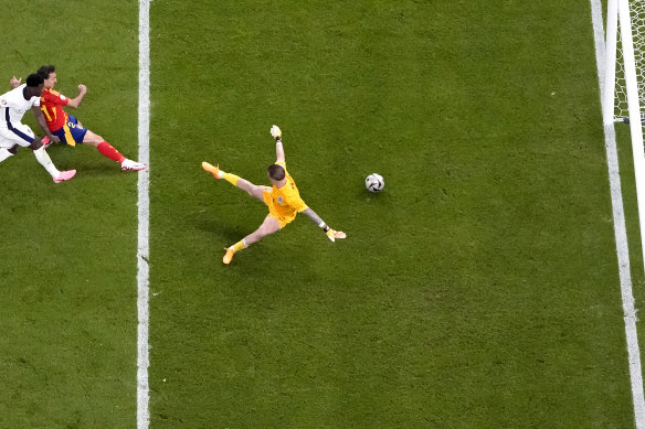 Spain’s Mikel Oyarzabal scores the winner.