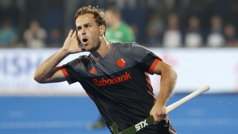 Finalists: The Netherlands' Jeroen Hertzberger celebrates after scoring off a shoot-out.