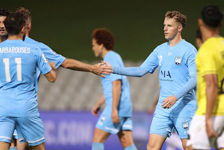 Trent Buhagiar gets a handshake after opening the scoring. 