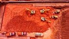 Iron ore is sorted at the Qingdao Port ore terminal in Qingdao, Shandong Province, China.
