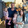 Cara and Jason Godwin with their two children Sage (2) and Summer (8 months) on their family home building site in Doubleview,