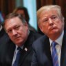 Trump downplays Russia hack, clashes with Pompeo