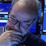 Wall Street stumbles as market volatility continues
