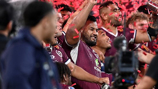 Taniela Tupou celebrates the Reds’ victory on Saturday night.