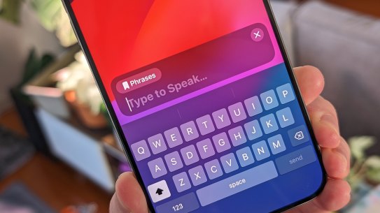 On iPhone, you tap the side button three times to activate Live Speech.