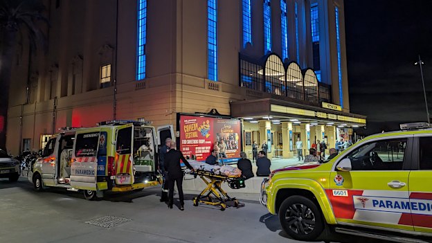 Paramedics at the Palais Theatre, where a man attending the Melbourne International Comedy Festival gala collapsed and died.