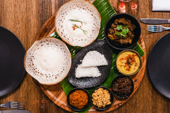 Many Little’s ambula offers a selection of curries, hoppers, pickles and condiments served on a banana leaf.