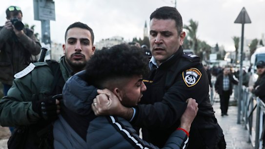 Israeli border police arrests a Palestinian ahead of a protest against Middle East peace plan announced Tuesday by US President Donald Trump.