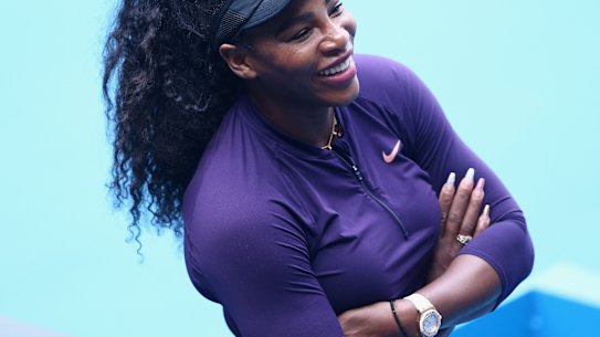 Serena Williams is all smiles after practicing at Melbourne Park on Sunday but chose to bypass an official pre-tournament press conference.