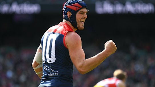 Angus Brayshaw celebrates a goal for the Demons.