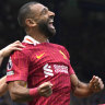 Mo Salah celebrates after scoring.