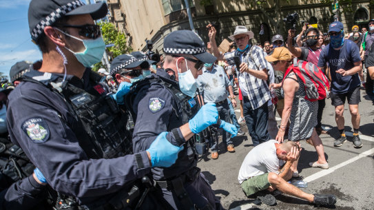 Capsicum spray was used by police on members of the crowd that gathered to protest against the Victorian government's response to COVID-19 and support conspiracy theories about the virus.