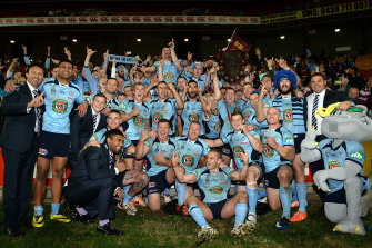 NSW celebrate their first series win over Queensland in nine years.