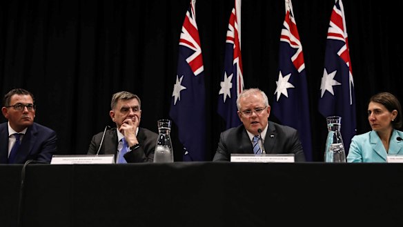 Victorian Premier Daniel Andrews, national Chief Medical Officer Brendan Murphy, Prime Minister Scott Morrison and NSW Premier Gladys Berejiklian on March 13.
