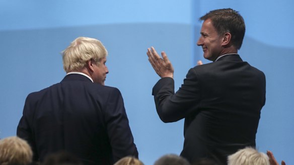 Jeremy Hunt, right, who after losing the leadership battle wanted to remain foreign secretary, turned down defence and is out of cabinet.