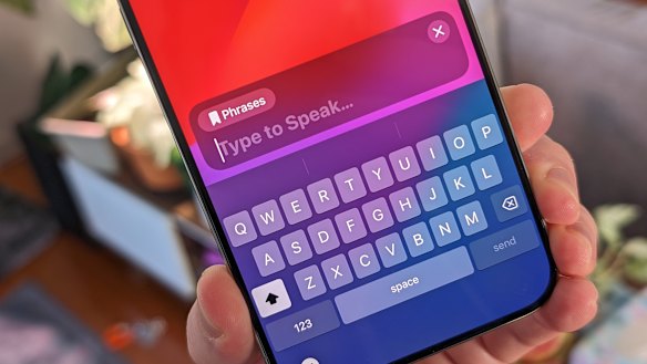 On iPhone, you tap the side button three times to activate Live Speech.