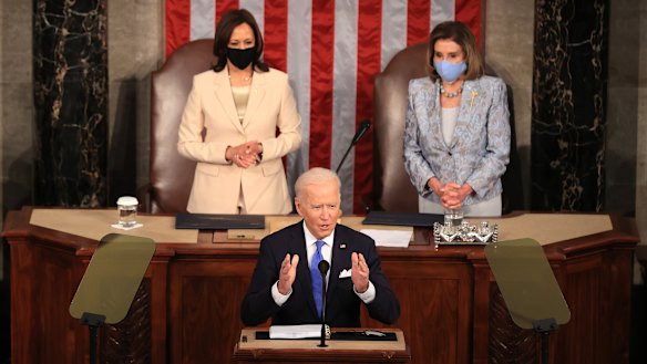 Joe Biden, flanked by Vice-President Kamala Harris and House Speaker Nancy Pelosi, delivers his first major speech to Congress as US President. 