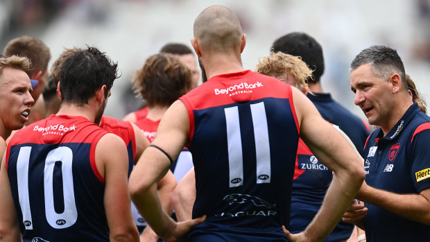 Adem Yze (far right) plans to use a deeper midfield rotation at Melbourne this season.