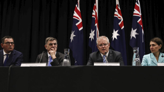 Victorian Premier Daniel Andrews, national Chief Medical Officer Brendan Murphy, Prime Minister Scott Morrison and NSW Premier Gladys Berejiklian on March 13.