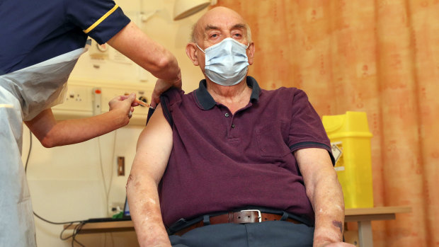 Brian Pinker, 82, receives the Oxford University/AstraZeneca COVID-19 vaccine in Oxford on January 4.