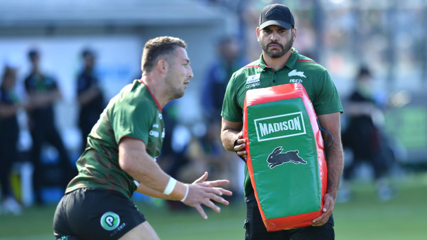 Greg Inglis helped with Souths warm-up on Saturday as he weighed up his own future. 