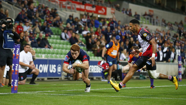 Andrew Kellaway scores a try for the Rebels earlier this year. 