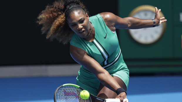Serena Williams hits a forehand return to Germany's Tatjana Maria during their first-round match at the Australian Open on Tuesday.