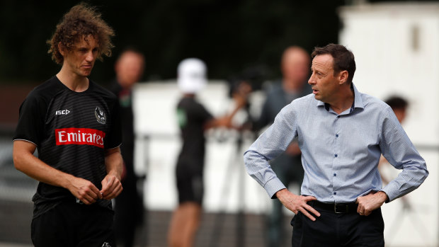 Collingwood CEO Mark Anderson (right) with Chris Mayne during a pre-season training session at Olympic Park Oval.