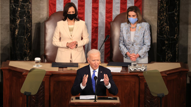 Joe Biden, flanked by Vice-President Kamala Harris and House Speaker Nancy Pelosi, delivers his first major speech to Congress as US President. 