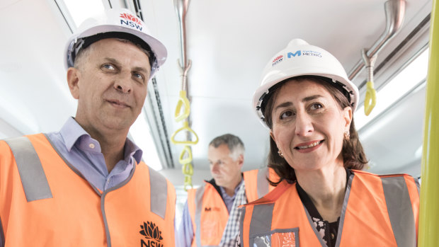 NSW Premier Gladys Berejiklian and the Transport and Infrastructure Minister Andrew Constance on the job.