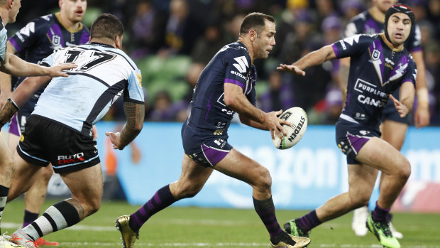 Mr Consistency: Cameron Smith runs the ball in his 400th NRL match.