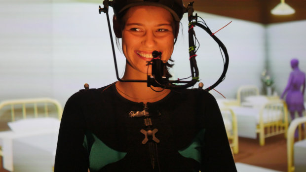 Actress Lily Sullivan wears a motion capture suit while filming her role as a nurse in the film.