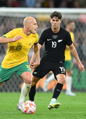 Australia’s Aaron Mooy looks to advance the ball in last year’s centenary match against New Zealand in Brisbane.