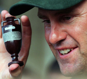 Australia’s cricket captain Mark Taylor holds the Ashes after Australia won the series 3-2.