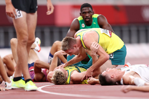 Cedric Dubler and Ashley Moloney of Team Australia react after competing in the Men’s Decathlon 1500m on day thirteen of the Tokyo 2020 Olympic Games at Olympic Stadium on August 05, 2021 in Tokyo, 