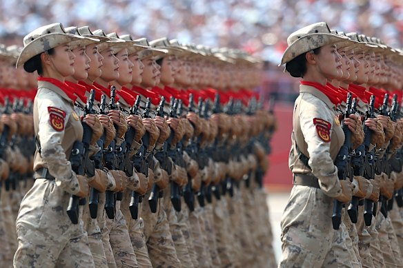 Soldiers march in lockstep during China’s military parade.