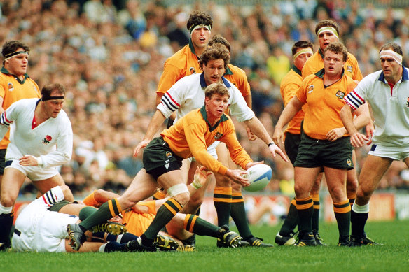 Nick Farr-Jones offloads the ball during the World Cup final between England and Australia at Twickenham on November 2, 1991. Australia won the match 12 to 6.