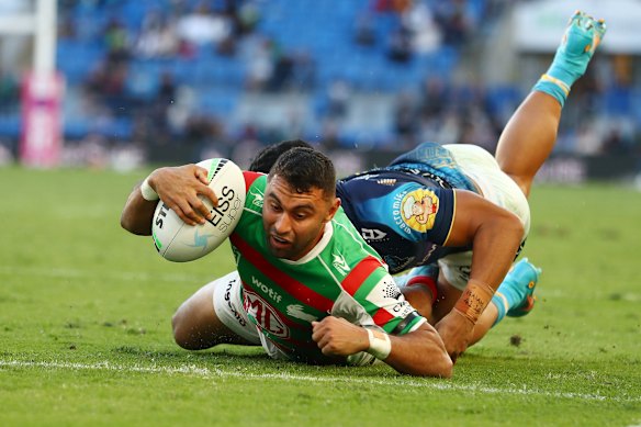 Alex Johnston scores on of his many tries.