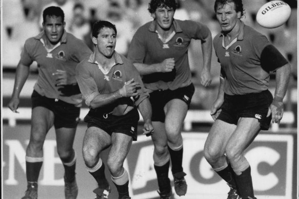 Richard Tombs passing for the 1991 Waratahs, with an array of star teammates.